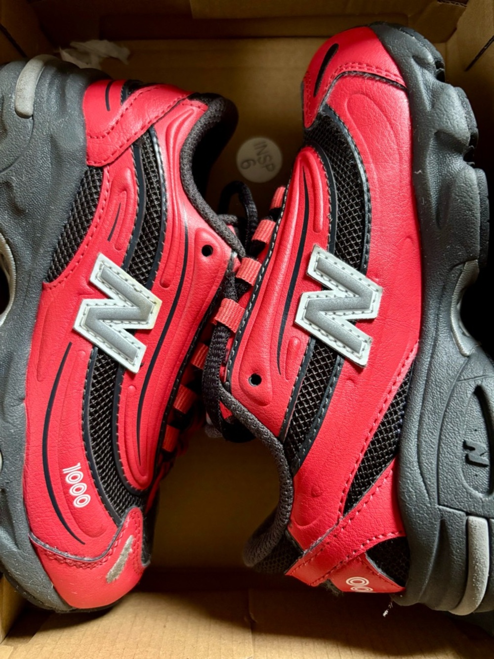 New Balance Kids Red and Black Sneakers
